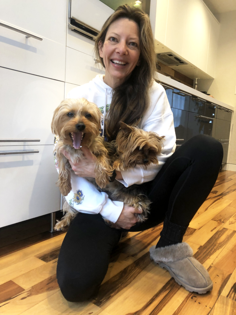 Picture of Julie Dahsm with her dogs, Stella and Penny.